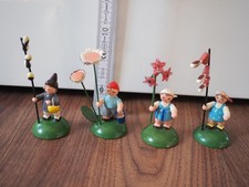 vier neuwertige Blumenkinder