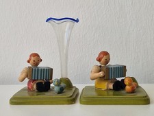 Blumenkind mit Vase –